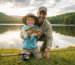 A father and son enjoying catching bluegill with an ultra-light fishing rod.