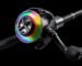 A close-up of the AKAKUMA colorful metal spinning reel showing its anodized finish and sturdy construction.